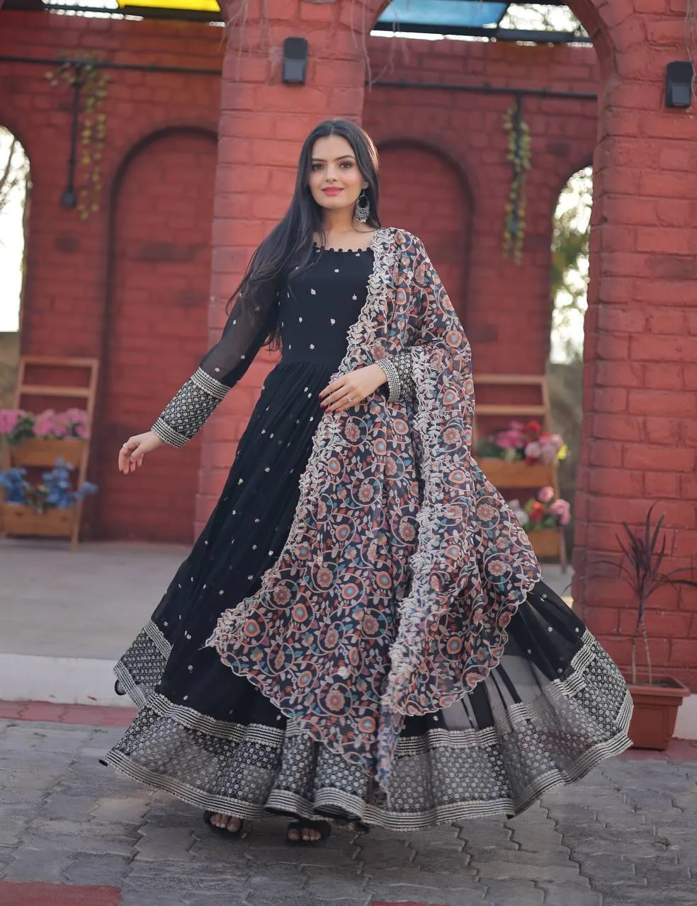 Outstanding Faux Georgette Zari Sequins Worked  Gown