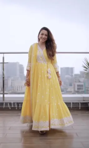 Yellow Color Heavy Embroidery Work Ruffle Style Gown